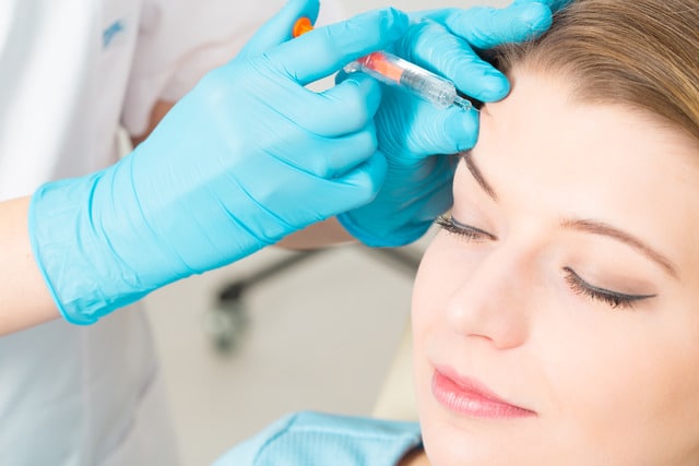 Cosmetic injectable treatment being administered